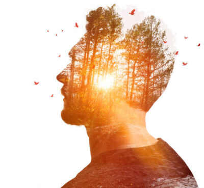 Multiple Exposure of young man and nature at sunset